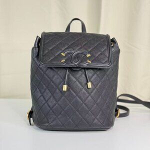 Chanel Black Caviar Filigree Backpack with Gold Accents & Quilted Design